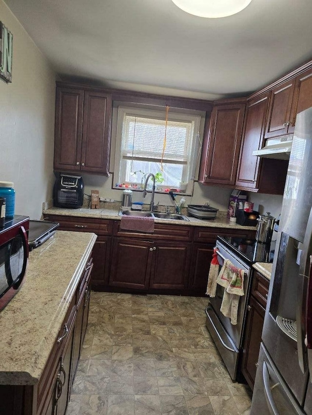 kitchen featuring sink and appliances with stainless steel finishes