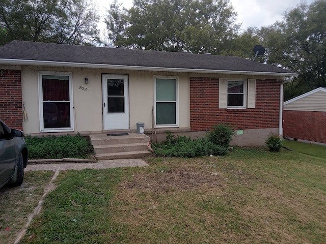 view of front of house with a front lawn