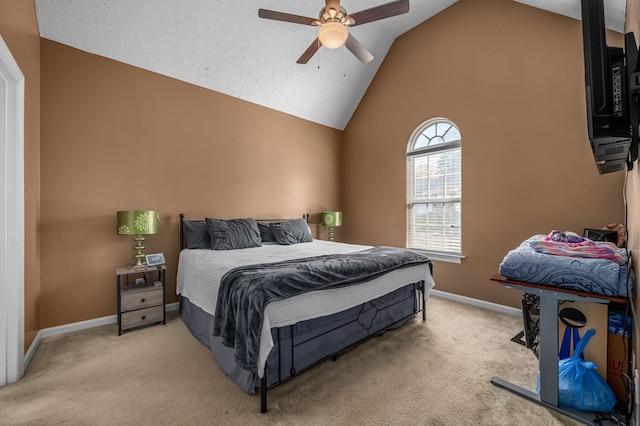 bedroom featuring ceiling fan, light carpet, and vaulted ceiling