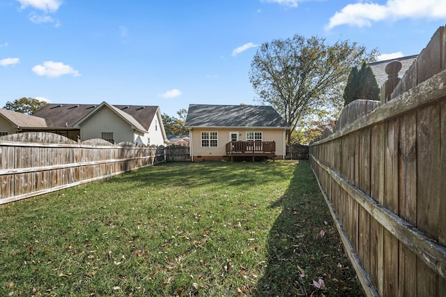 view of yard featuring a wooden deck