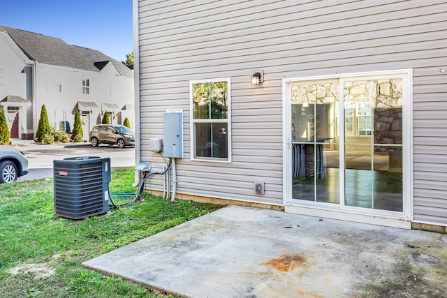 view of patio with central AC