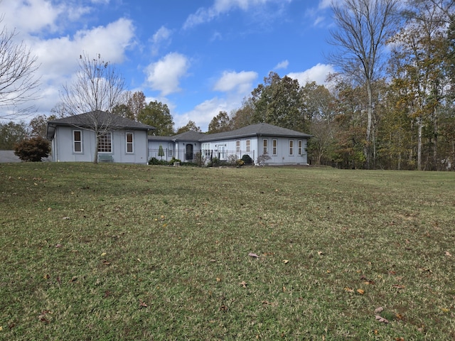 exterior space featuring a lawn