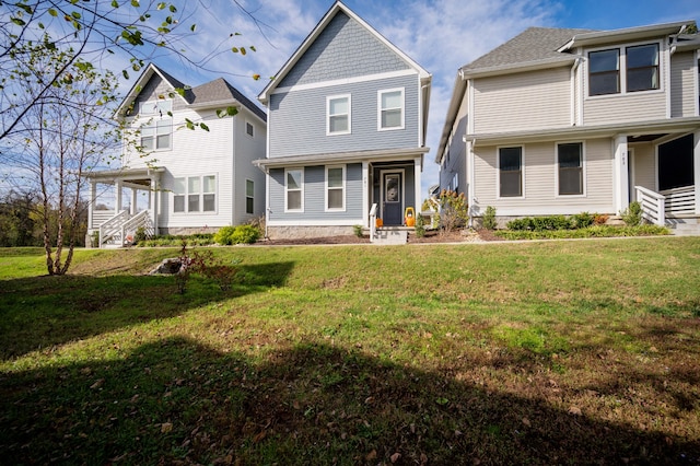 view of front of house with a front lawn