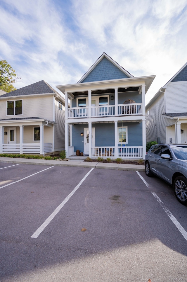 view of front of house with a balcony