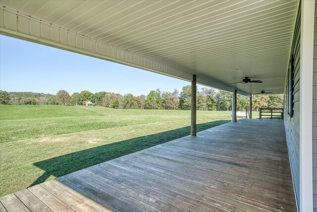308 Huse Watson Rd, Oakdale, TN 37829 - wooden deck featuring a ceiling fan, a lawn, and view of wooded area
