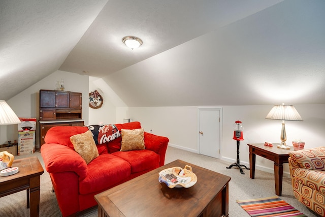 living room with carpet and vaulted ceiling