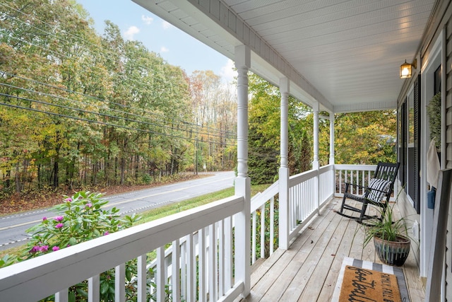 wooden deck featuring a porch