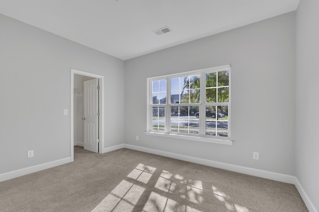 view of carpeted spare room