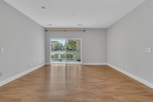 empty room with light wood-type flooring