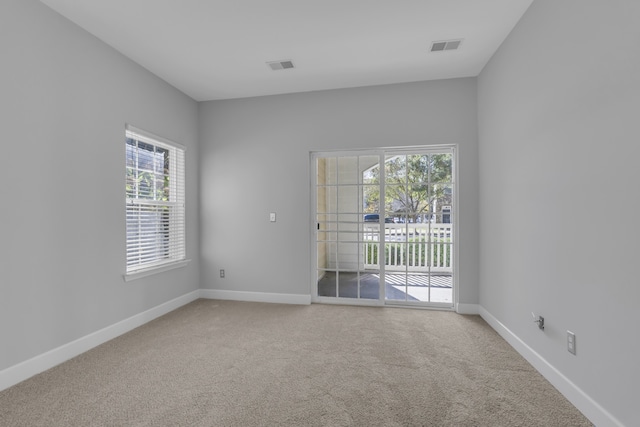 empty room featuring carpet floors