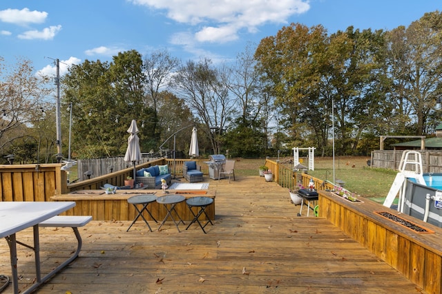 wooden deck with area for grilling