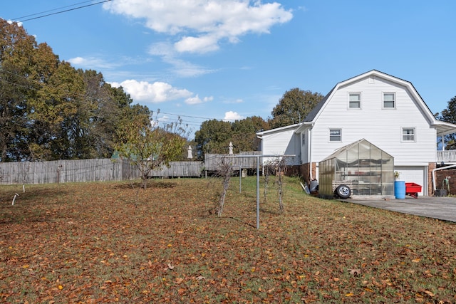 view of yard featuring a garage