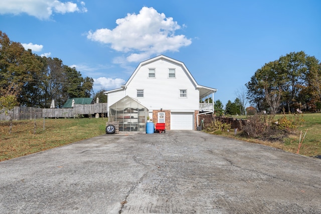 view of property exterior with a garage