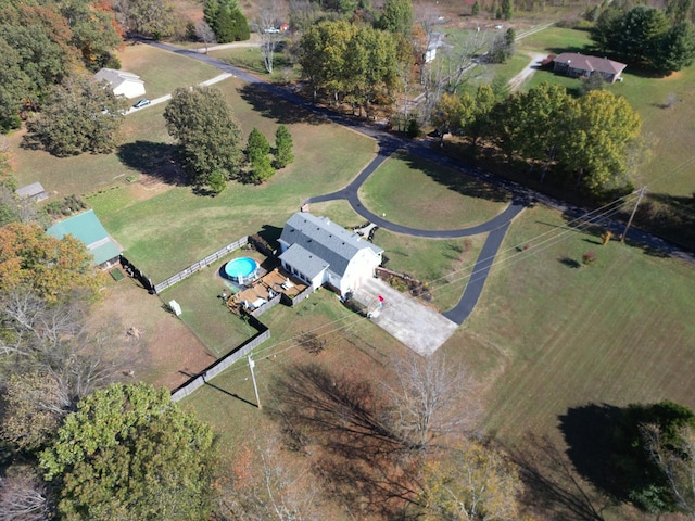 birds eye view of property with a rural view