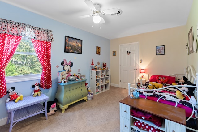 bedroom featuring ceiling fan and carpet floors