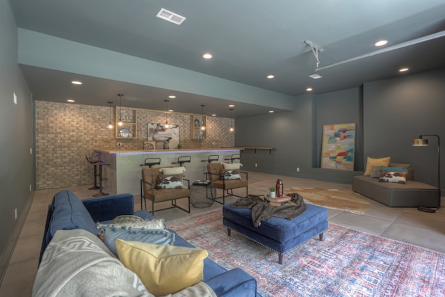 living room with light tile patterned floors