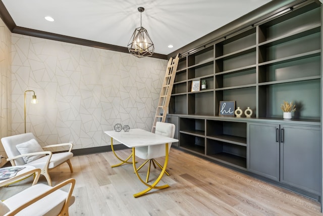 home office featuring light hardwood / wood-style flooring, crown molding, and an inviting chandelier