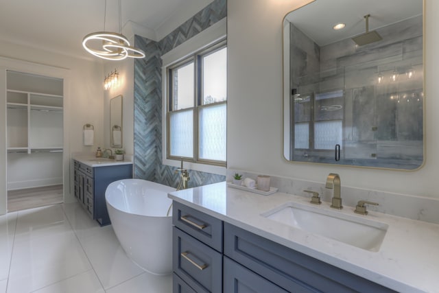 bathroom with vanity, independent shower and bath, and tile patterned floors