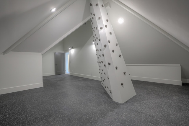 bonus room featuring lofted ceiling