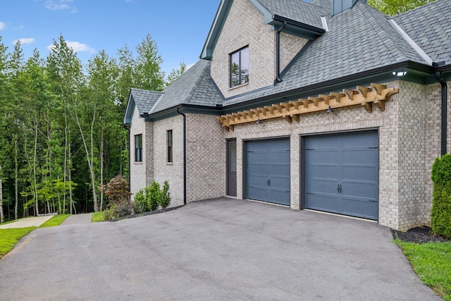 view of property exterior with a garage