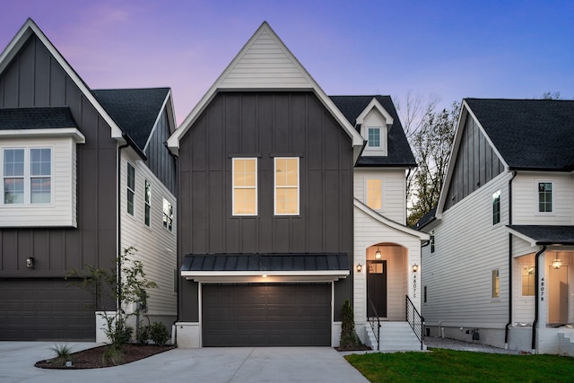 modern farmhouse style home featuring a garage