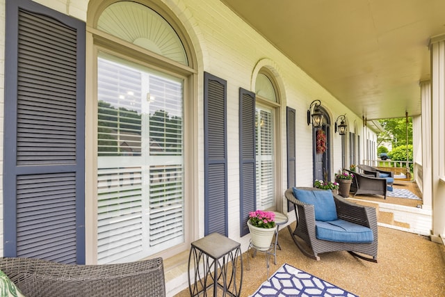 view of patio featuring a porch