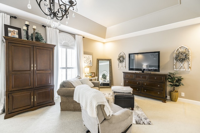 living room featuring a chandelier and light colored carpet