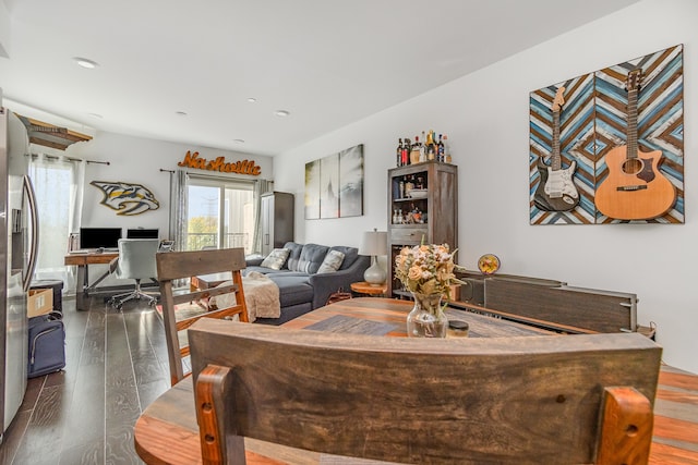 dining room featuring dark wood-type flooring