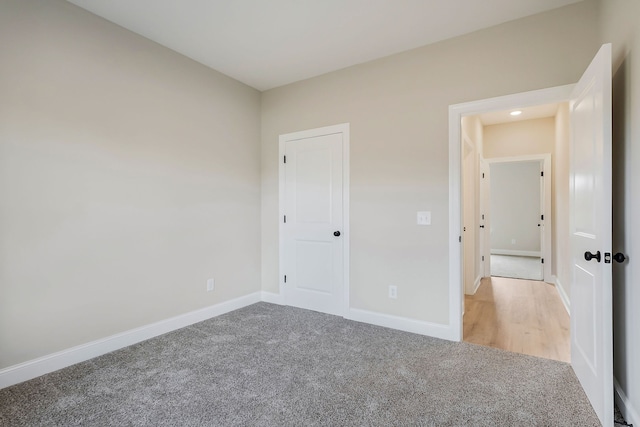 unfurnished bedroom with carpet