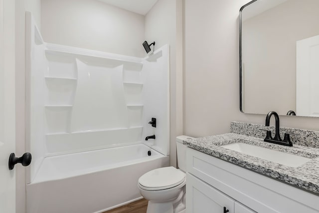 full bathroom with toilet, vanity, hardwood / wood-style flooring, and  shower combination