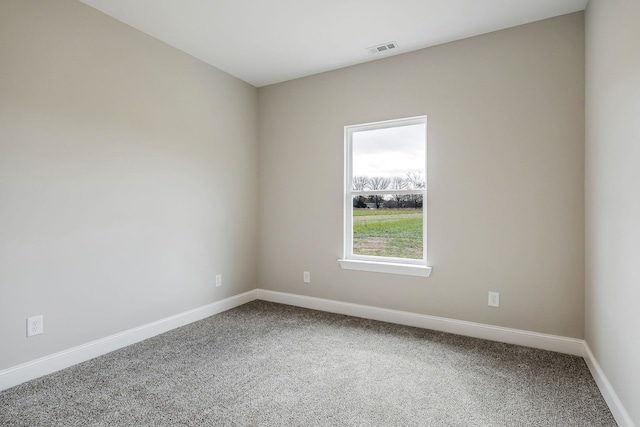 spare room with carpet flooring