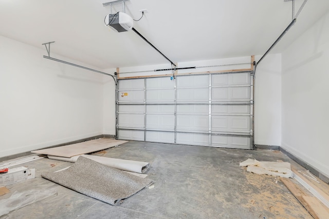 garage featuring a garage door opener