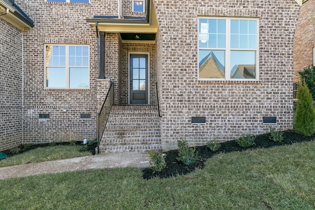 view of side of home featuring a yard