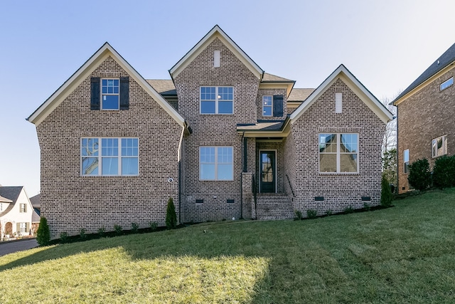 view of front of home with a front yard