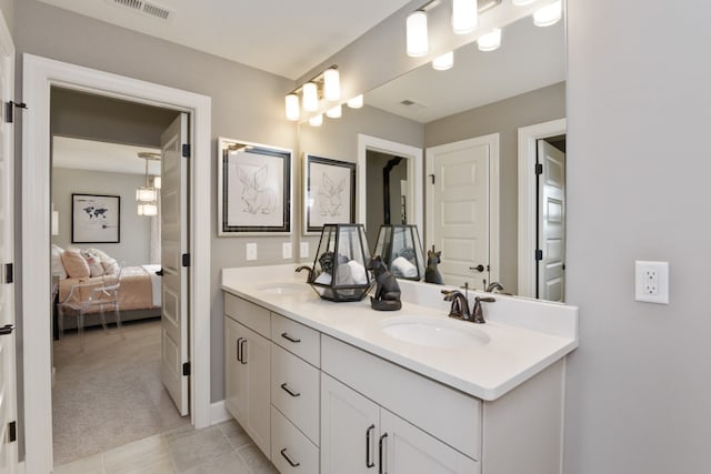 bathroom featuring vanity and tile patterned floors