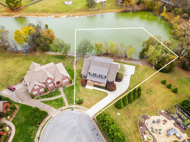 bird's eye view with a water view