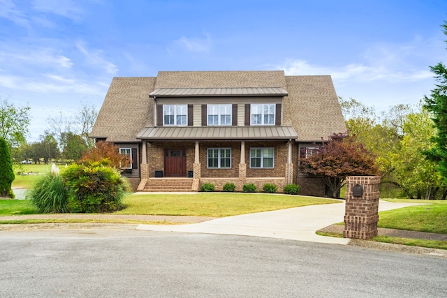 view of front of home with a front yard