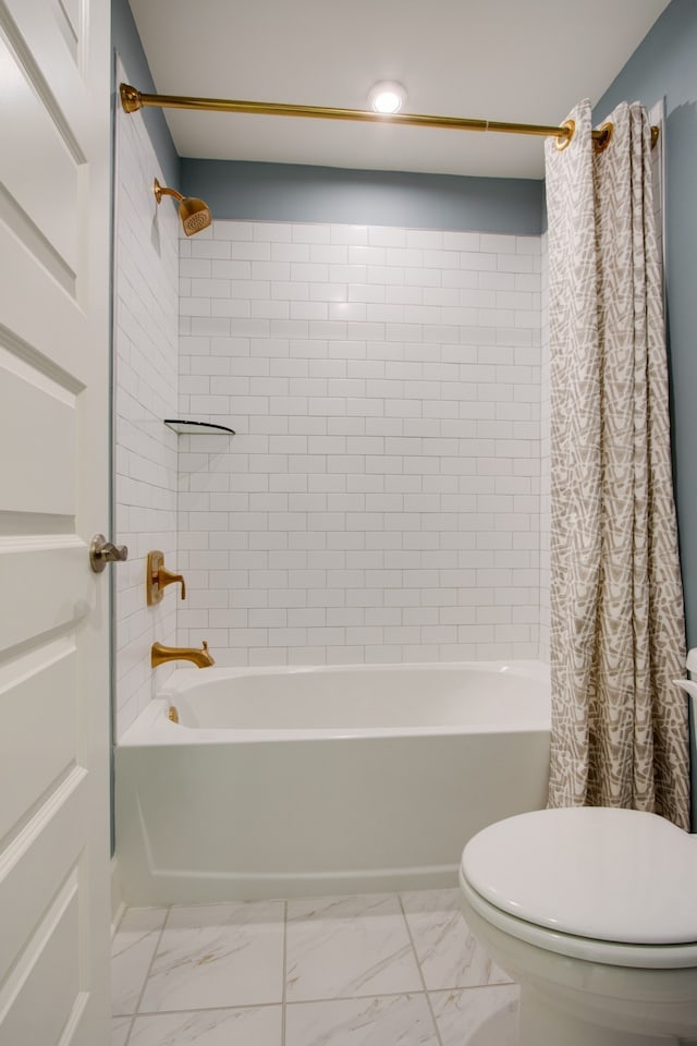 bathroom featuring toilet and shower / bath combo with shower curtain