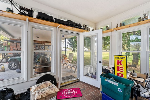 sunroom / solarium featuring a wealth of natural light