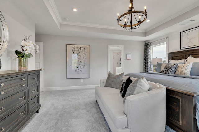 carpeted bedroom featuring a notable chandelier, a raised ceiling, and ornamental molding