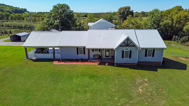 view of front facade with a porch and a front lawn