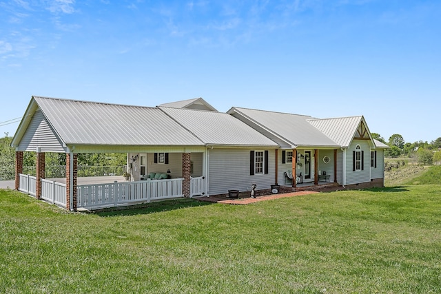 view of front facade with a porch and a front lawn