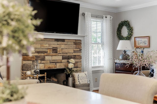 bedroom with a fireplace and crown molding