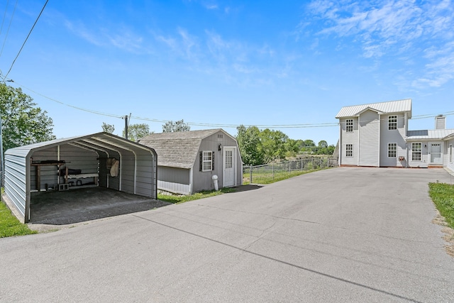 view of front facade with a carport