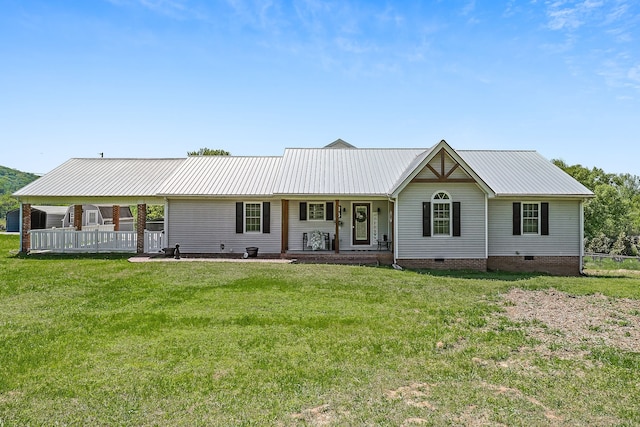 ranch-style home with a front lawn and covered porch