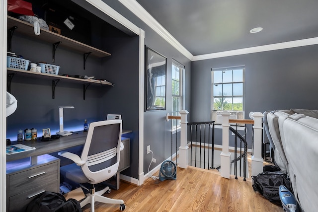 office space featuring wood-type flooring, cooling unit, and ornamental molding