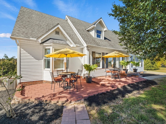 rear view of house with a patio area