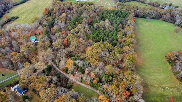 birds eye view of property featuring a rural view