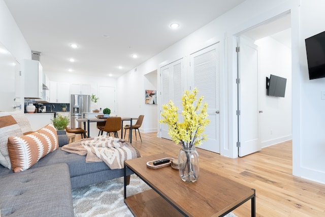 living room with light hardwood / wood-style floors