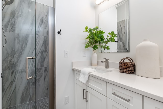 bathroom with vanity and an enclosed shower